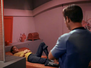 Kirk reclines, smugly.