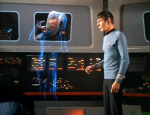 A phased-out Kirk floating on the bridge.